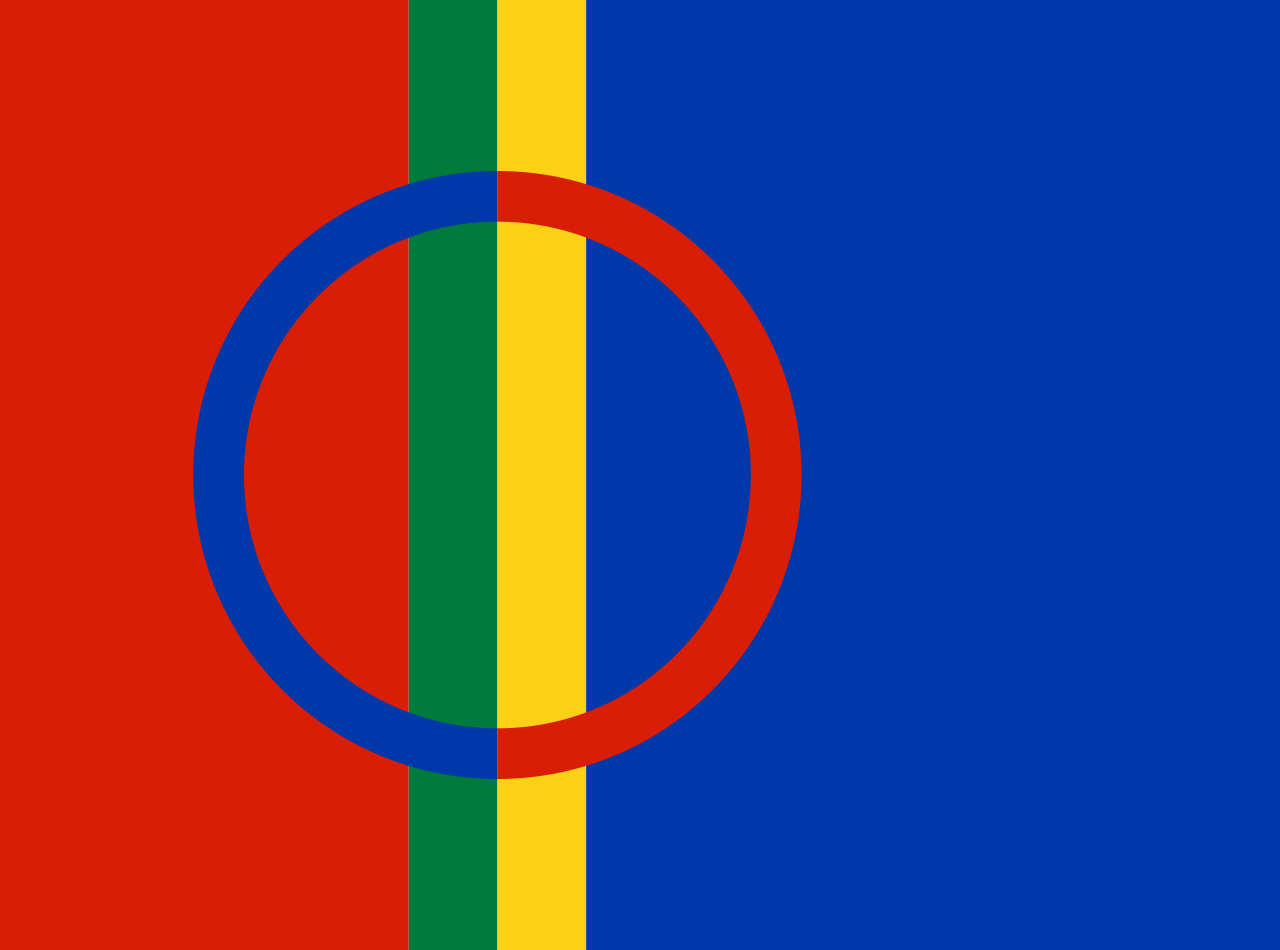 The official Sami flag from 1986. In addition to the colours proposed by Persen, it includes a green stripe and a divided circle The Sami flag